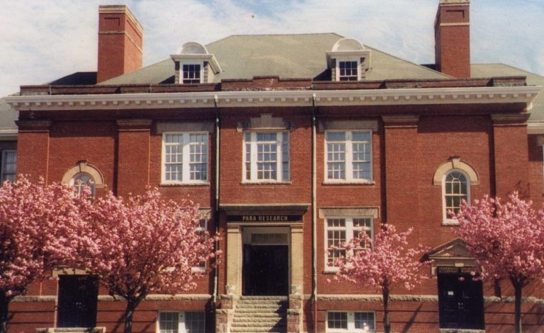 The brick building at 85 Eastern Avenue, Gloucester, where the firm keeps Suite 306.